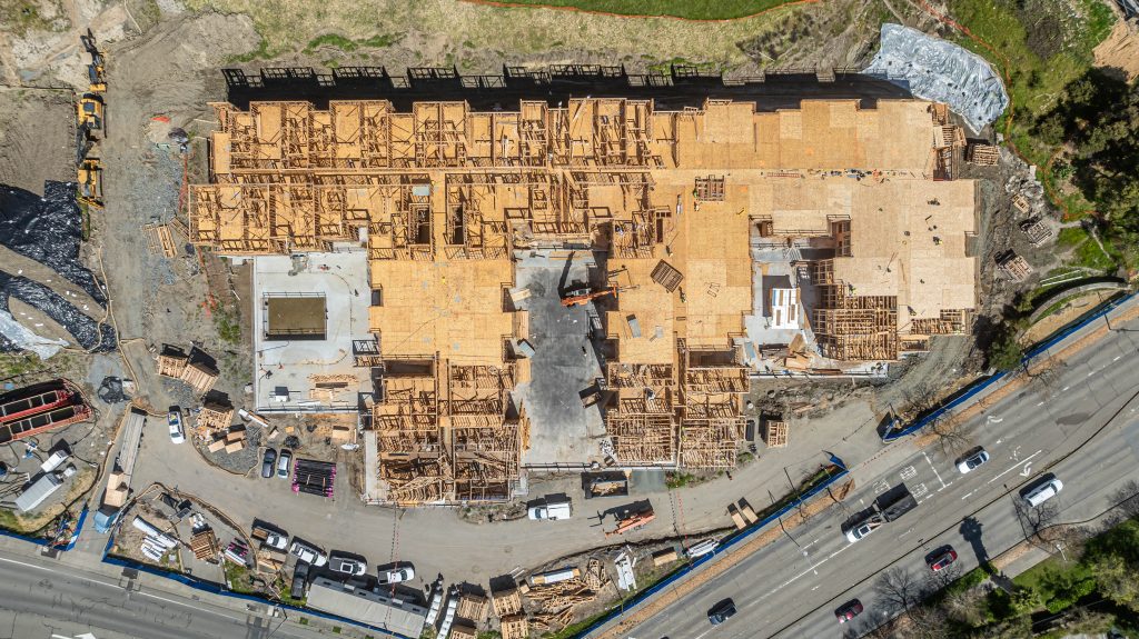 Building framework made from wood with visible structural elements like rafters and joists