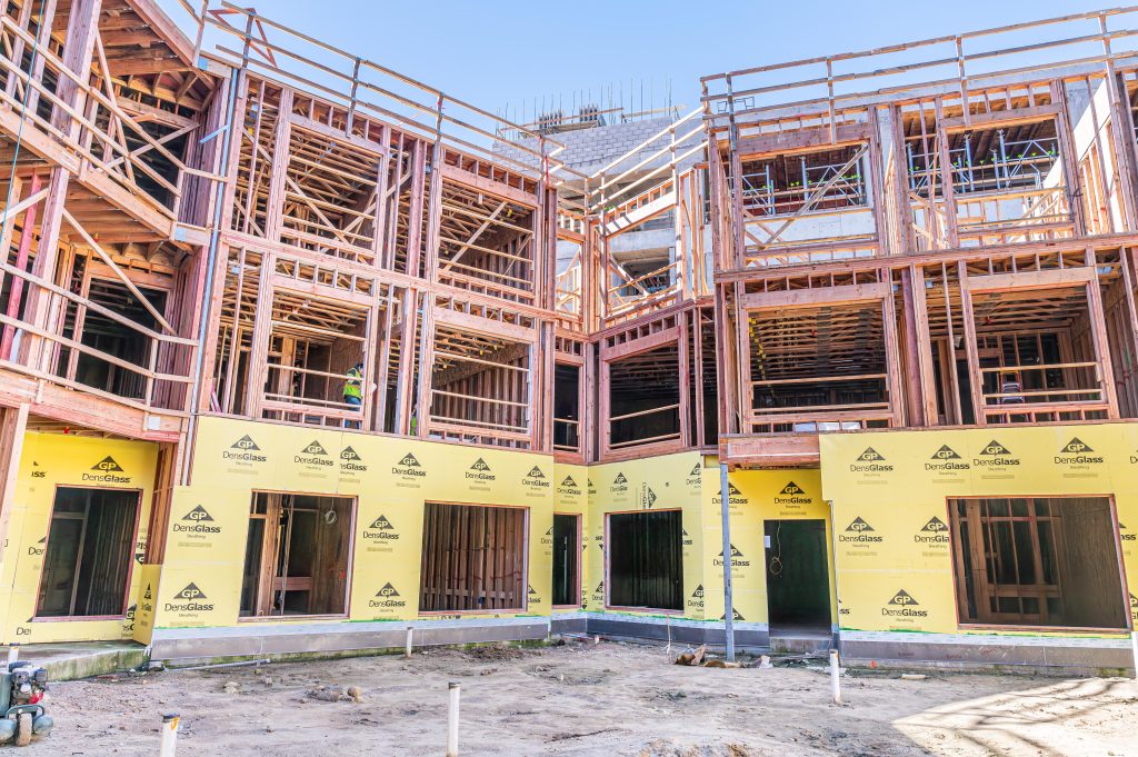 Detailed view of a timber framework for a new building with visible structural components