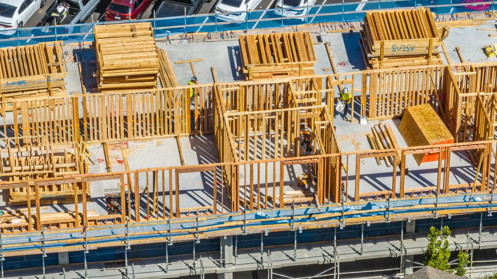 Framework of a wooden building with visible framework and incomplete roof structure