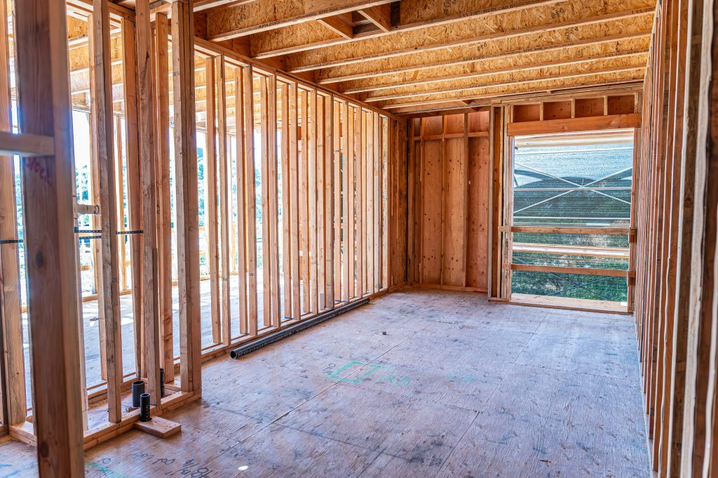 Close-up of a wooden frame construction showing detailed joinery and support beams